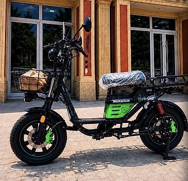 Elektrik yüklü skuter Elektrik yüklü skuter 100-110km məsafə gedir