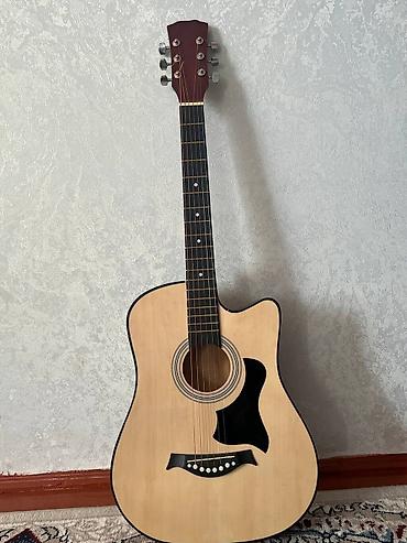 Гитары: Акустическая гитара с вырезом (cutaway) формата дредноут — 6