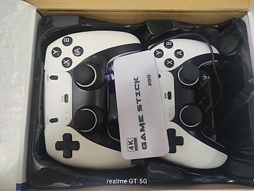 playstation 4 pro 2tb: Игровая приставка Game Stick Pro 4K + 2 беспроводных геймпада - — 4