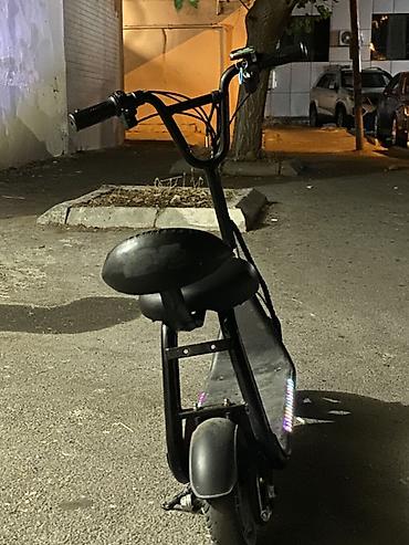 Электротранспорт: Oturacaqlı elektrik skuter -saatda 20 km surerle hereket edir — 4