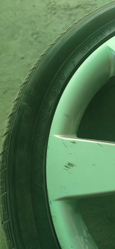 r18 lx: Литой автомобильный диск с установленной шиной. Характеристики: - — 1