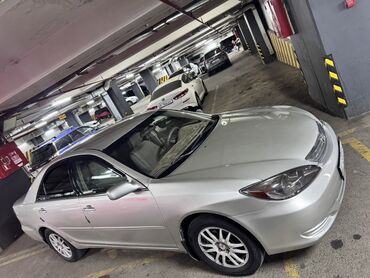 шевроле камаро цена: Серый седан Toyota Camry, подходящий для повседневных поездок