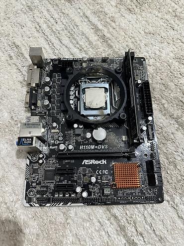 Материнская плата ASRock H110M-DVS с установленным процессором и