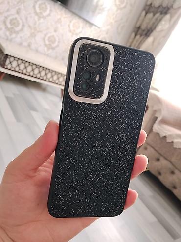 vətən n muhafizə: Redmi 12, 128 GB, rəng - Qara, Sensor, Barmaq izi, Simsiz şarj — 2