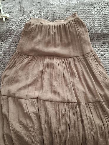 Bej rəngli uzun ətək - Stil: qat-qat kəsim, yüngül plisə effektli