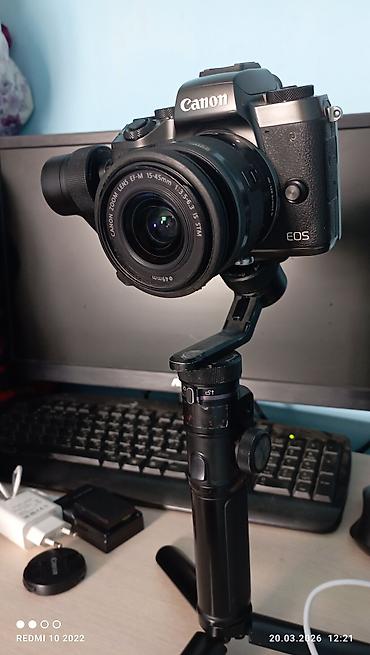 Фотоаппараты: Беззеркальная камера Canon EOS M-серии с кит-объективом Canon Zoom — 9