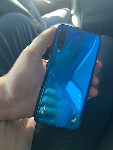 playstation 3 en ucuz: Xiaomi Mi A3, 64 GB, rəng - Mavi, 
 Barmaq izi — 1