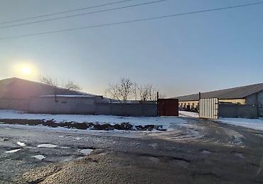 Продажа складов и мастерских: Продам территорию со складскими помещениями, на территории имеются — 2