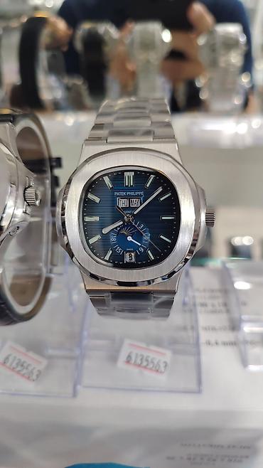 casio saat: Patek Philippe Nautilus stili kişi qol saatları – çoxfunksiyalı, zərif — 3