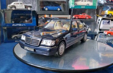 sapaşqi modelleri: Коллекционная модель Mercedes-Benz S500 W140 blue 1994 NOREV Dealer