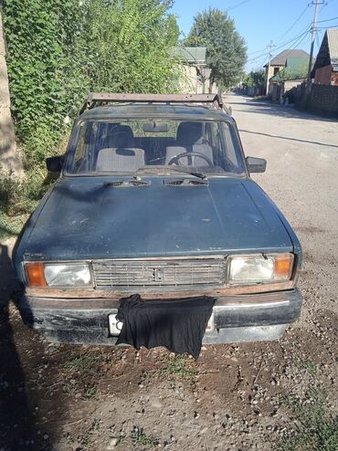 шины на ниву: Автомобиль универсал, оснащенный багажником на крыше. Модель имеет