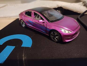 tesla maşın: Işıqlıdır hərşeyi isdiyir kapılar acilır real alıcıya endirim olacaq — 2