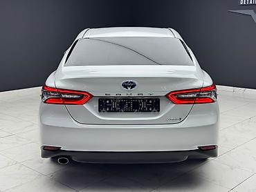 kamri 75: Toyota Camry: 2023 г., 2.5 л, Автомат, Гибрид, Седан — 6