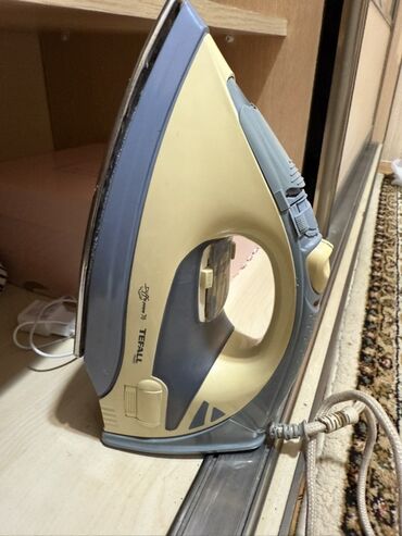 utulər: Buxarlı ütü, Tefal