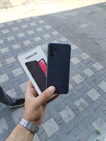 телефон fly 2040i: Samsung Galaxy A13, 64 ГБ, цвет - Серый, Кнопочный, Отпечаток пальца, Две SIM карты