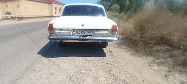24 volqa: Model: GAZ Volga (GAZ-24 seriyası) Kuzov: sedan, ağ rəng Nömrə nişanı — 4