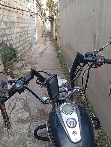 zarya: Kruizer tipli motosiklet Xüsusiyyətlər: - Tək silindrli benzin — 5