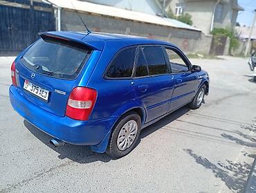 чехол на мазду: Mazda 323: 2001 г., 1.6 л, Механика, Бензин, Хэтчбэк — 2