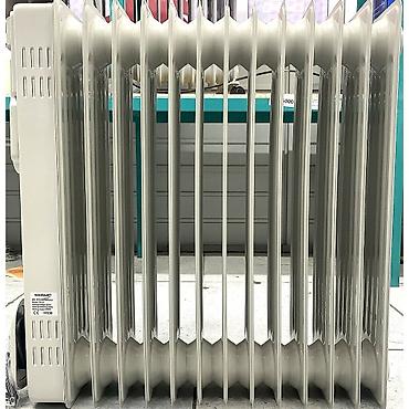 Масляные обогреватели: Масляный обогреватель Кол-во секций: 9, Отключение при падении, Защита от замерзания, Быстрый нагрев — 10