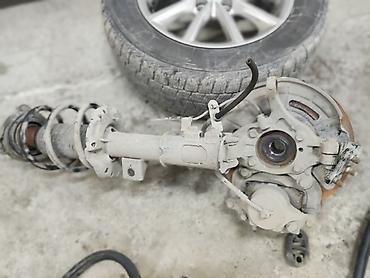 Другие детали ходовой части: Передняя подвеска в сборе для легкового автомобиля. Состав узла: - — 2