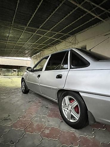 митсубиси спайк стар: Daewoo Nexia: 2012 г., Седан — 4