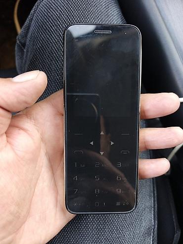 счетная машинка для денег: Dizaynlı düyməli mobil telefon - Ön hissə: toxunma hissiyatlı şüşə — 1