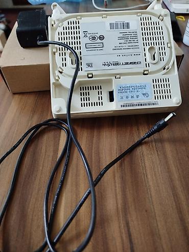 wifi modem satilir: Modem ruter satilir. lan ve optik kabelle isleyir — 3