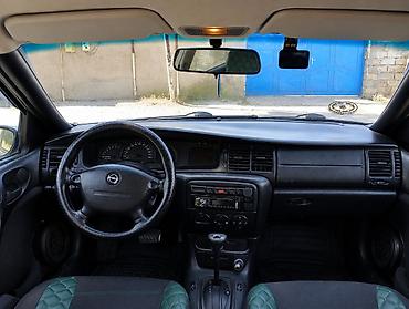 6 neferlik masin: Opel Vectra: 1.8 l | 1996 il 558239 km Sedan — 8