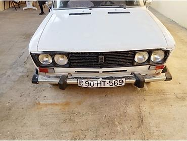 mtz 1025.2 satilir: VAZ 2106 avtomobili təqdim olunur. Klassik sedan kuzovlu modeldir, ağ — 1