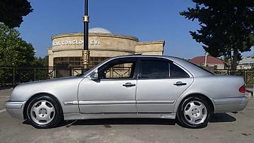 yan guzgulər s: Mercedes-Benz E-Class: 2.8 l | 1997 il Sedan — 5