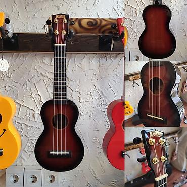 ukulele: Ukulele Mahalo MJ13TS Simlərin sayı: 4 Simlər:Aquila Qol: Mahogany — 1