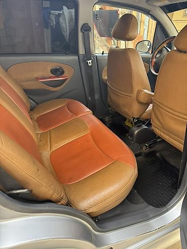 Другие автомобили: Компактный городской хэтчбек серебристого цвета. Характеристики и — 9