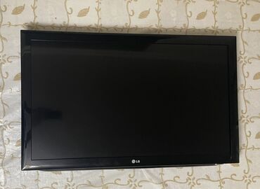 плазменные телевизоры бу: Телевизор LG с плоским экраном и черной рамкой. Оснащен различными