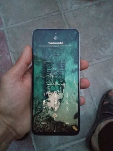 orjinal redmi airdots: Redmi markalı bu ağ rəngli smartfon, iki arxa kamera ilə təchiz