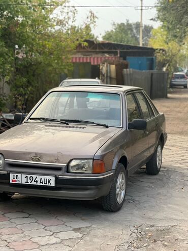 прокачка аммортизаторов: Ford Escort: 1986 г., Автомат, Седан