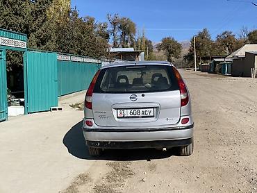 тико 2: Nissan Almera Tino: 2001 г., 2.2 л, Кол менен иштөөчү, Дизель, Хетчбек — 4