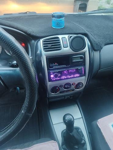 Mazda: Mazda 323: 2000 г., Универсал — 10