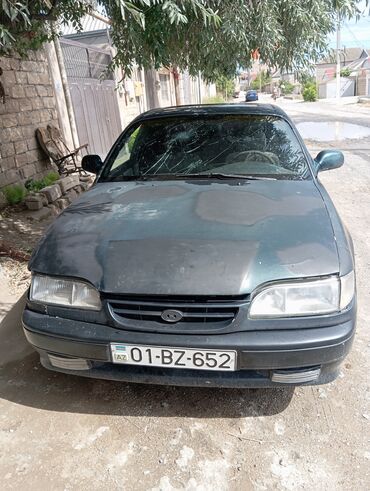 masin baqajlari: Hyundai Sonata: 2 l | 1995 il Sedan