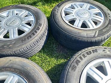 колесо ауди: Комплект из 4 колес Audi: литые диски с фирменными колпаками Audi и — 8