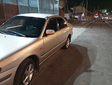mazda kronos: Mazda Capella: 1999 г., Механика, Бензин, Седан — 5