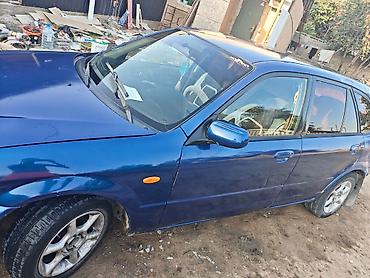 х трейл: Mazda Familia: 2000 г., 1.5 л, Механика, Бензин, Хэтчбэк — 6