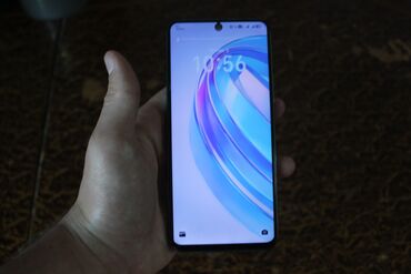 телефон fly iq4406: Honor X8a, 128 ГБ, цвет - Белый, Сенсорный, Отпечаток пальца, Беспроводная зарядка