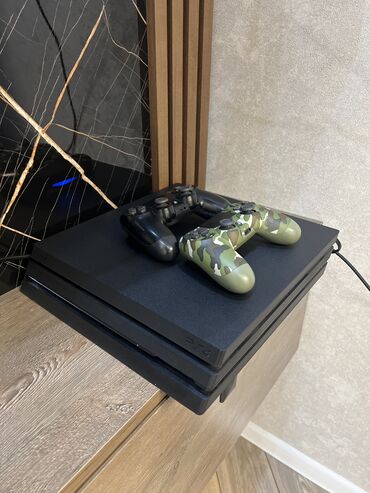 сколько стоит playstation 2: PlayStation 4 pro, 1TB yaddaş və 2 original pult. Tək sahibi mən