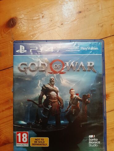 psp biz ua: PlayStation 4 üçün nəzərdə tutulmuş God of War oyununun diski. Bu