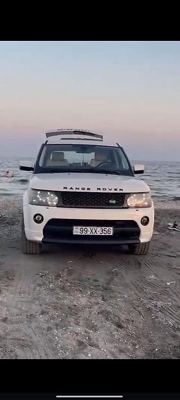 Land Rover: Range Rover Sport – ağ rəngdə, 5 qapılı SUV. Əsas xüsusiyyətlər: - — 2