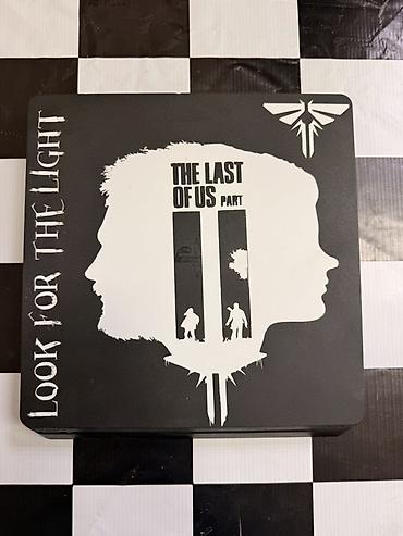 sony uslitel: PlayStation 4 Slim – The Last of Us Part II vinil temalı xüsusi — 1