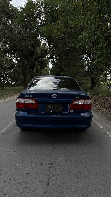 rota grid: Mazda 626: 2000 г., 1.8 л, Механика, Бензин, Седан — 4