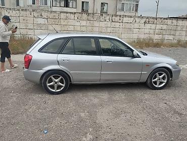 e53 amg: Mazda 323: 2003 г., 1.5 л, Механика, Универсал — 8