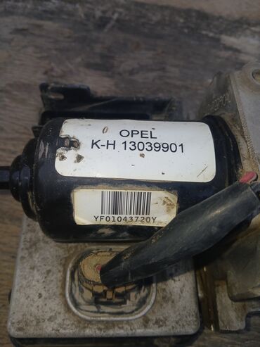 ABS, EBD sistemləri: Opel markalı, K-H 13039901 model nömrəli ABS nasosu. Avtomobilin əyləc