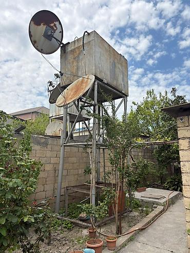 peyin: Metal çən və dayaq konstruksiyası - Üst hissədə böyük həcmli metal su — 4